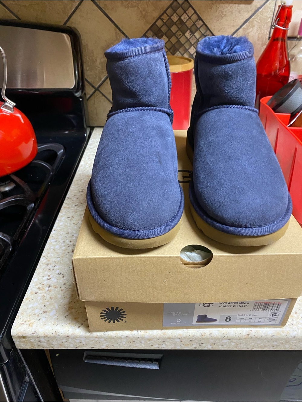 UGG woman’s Navy Suede Short Boot